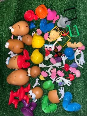 Huge Lot of Mr. Potato Heads various sizes and pieces!